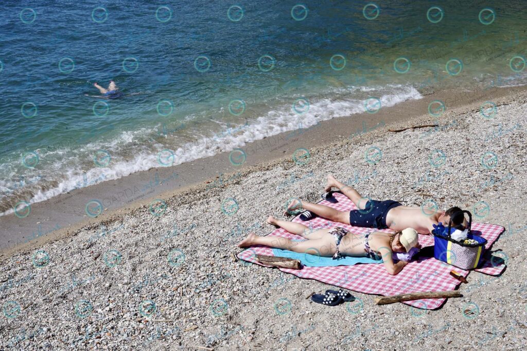 Tignale – sunbathing at the beach
